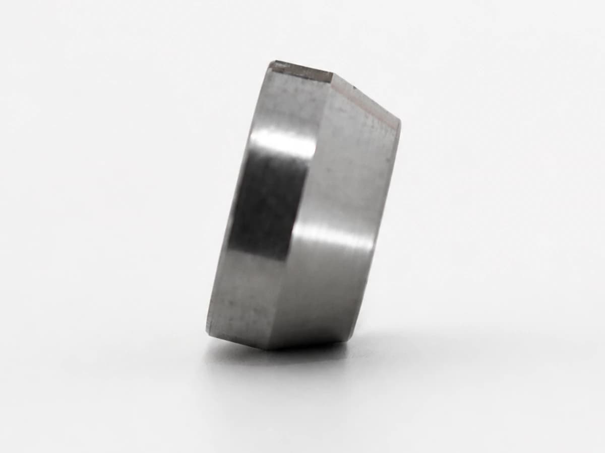 Side factory view showing the tapered profile of a cotton picker spindle dust locking collar